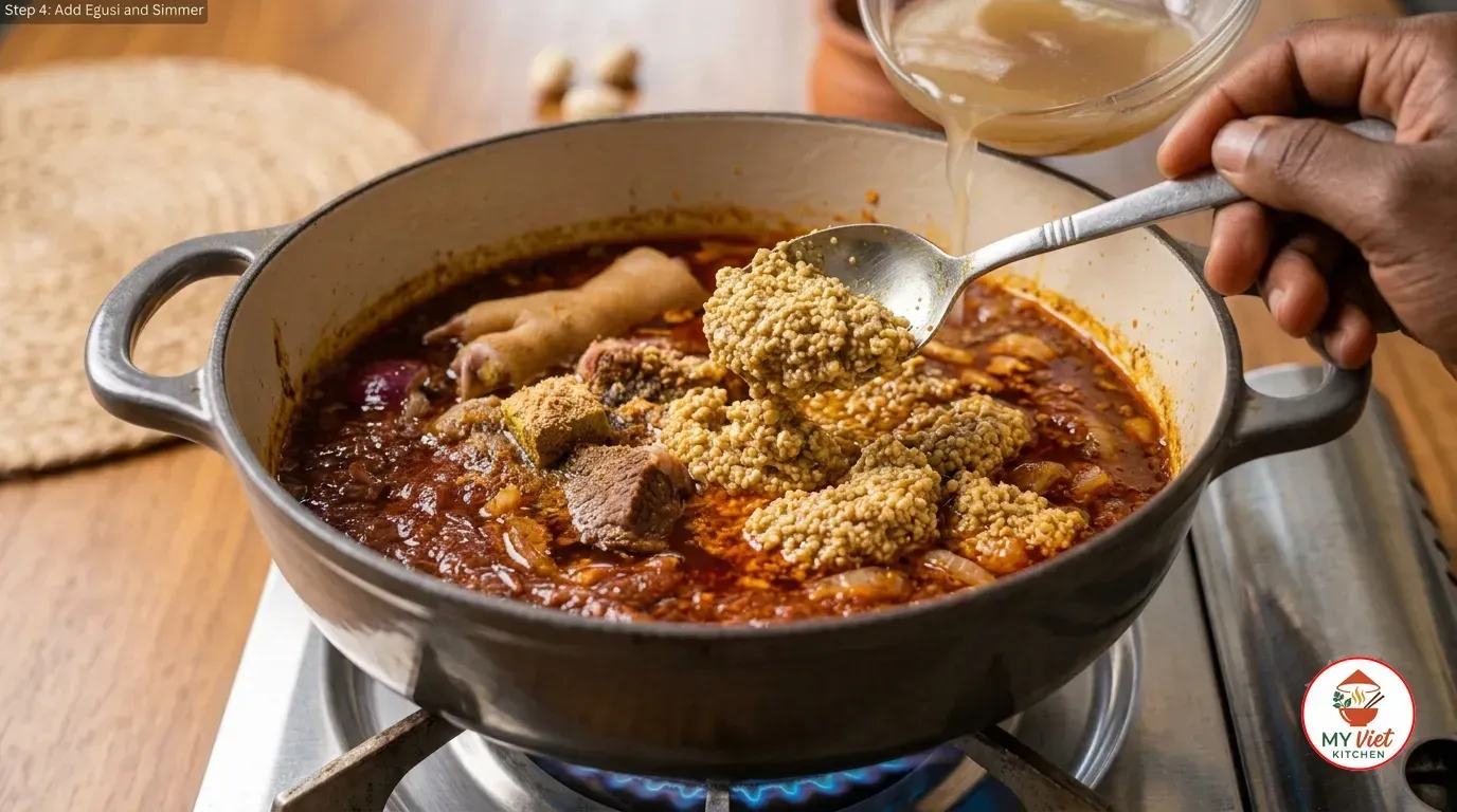 Step 4- Add the Egusi and Simmer